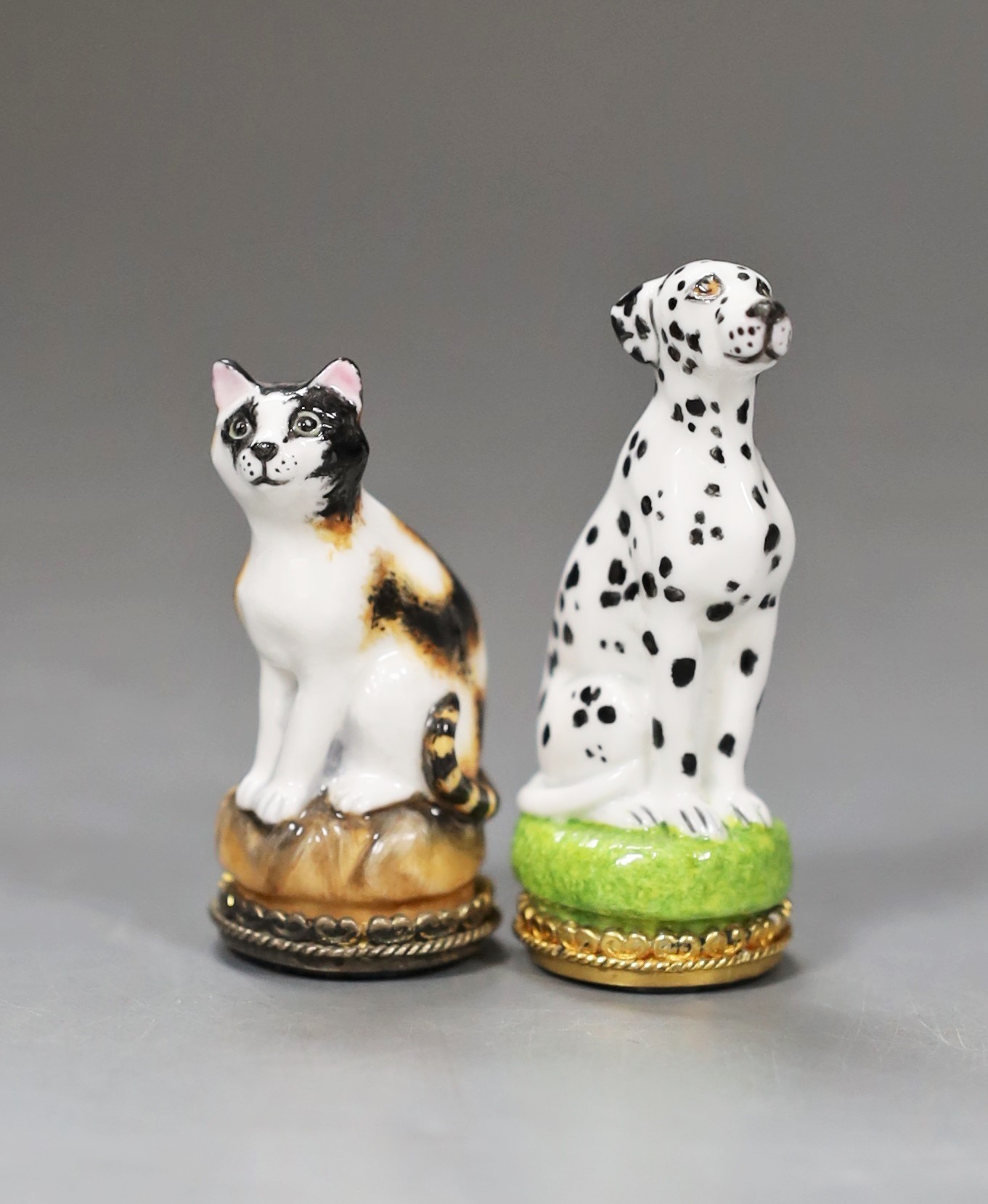 Two Halcyon Days bonbonnieres; Dalmatian, 5.5cm, and cat, both boxed.